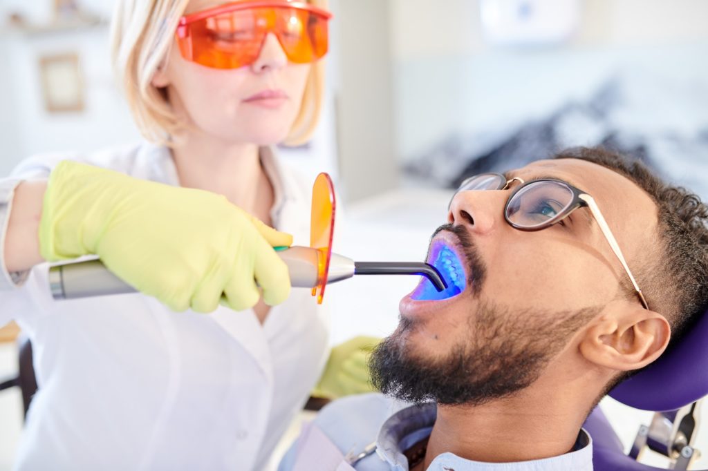 Undergoing Teeth Whitening Procedure